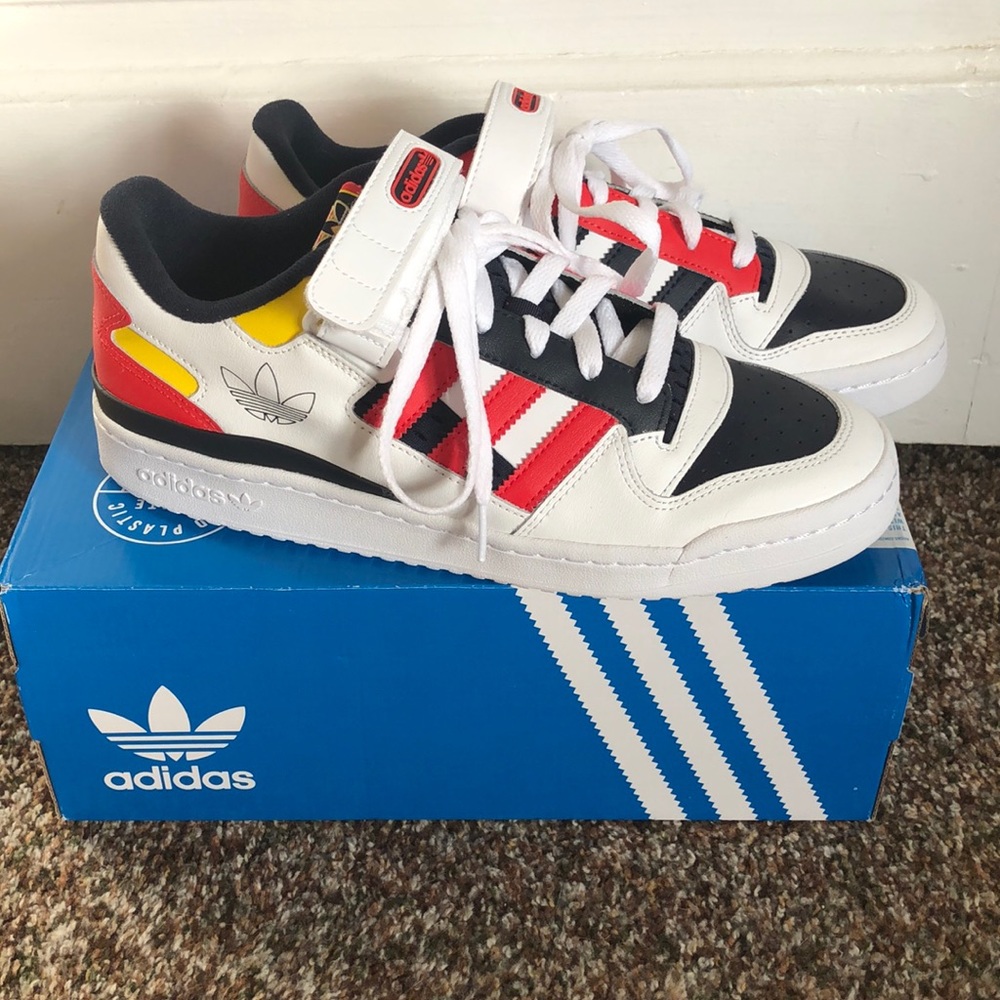 Adidas shoes: white, blue, yellow & red with strap